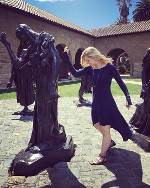 Madi posing with Auguste Rodin's 'The Burghers of Calais' at Stanford University